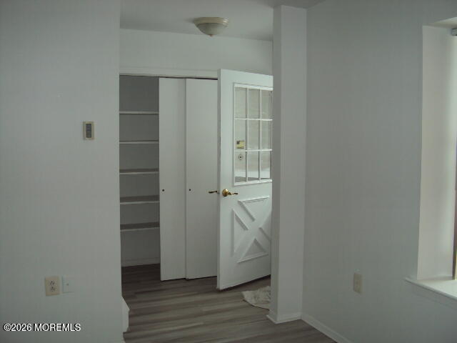 12 Spring Street, Unit D Whiting, NJ 08759 - Photo 1 of 14 an empty room with wooden floor and sink