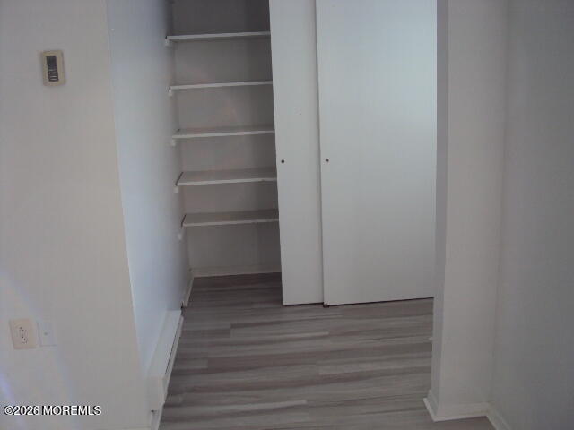 12 Spring Street, Unit D Whiting, NJ 08759 - Photo 2 of 14 a view of an empty walk in closet