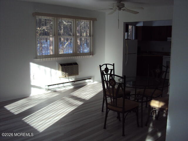 12 Spring Street, Unit D Whiting, NJ 08759 - Photo 3 of 14 a dining room with furniture and window