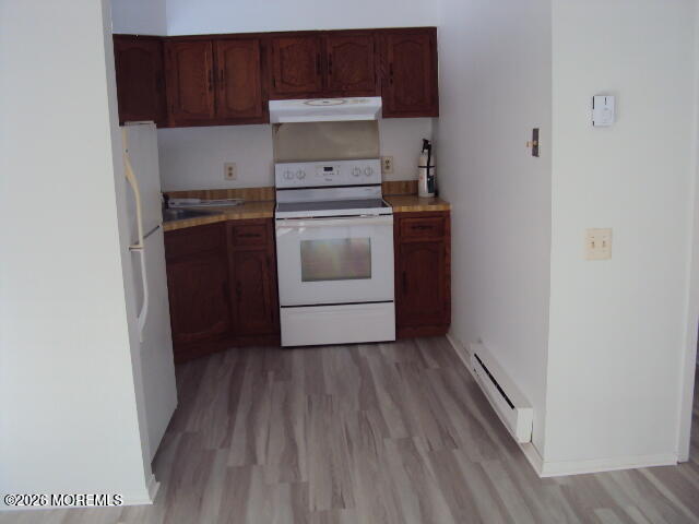 12 Spring Street, Unit D Whiting, NJ 08759 - Photo 10 of 14 a utility room with sink dryer and washer