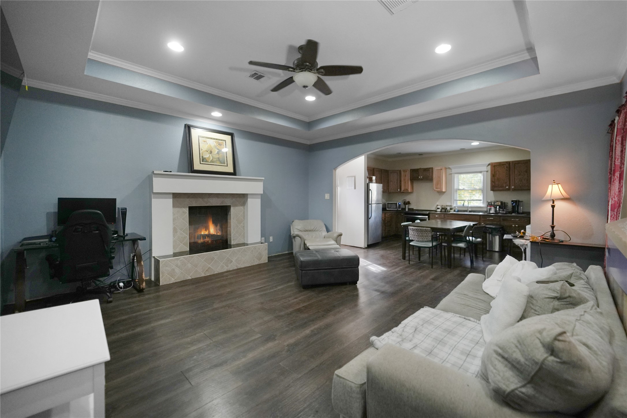 13475 5th Street Splendora, TX 77372 - Photo 1 of 16 a living room with furniture and a fireplace
