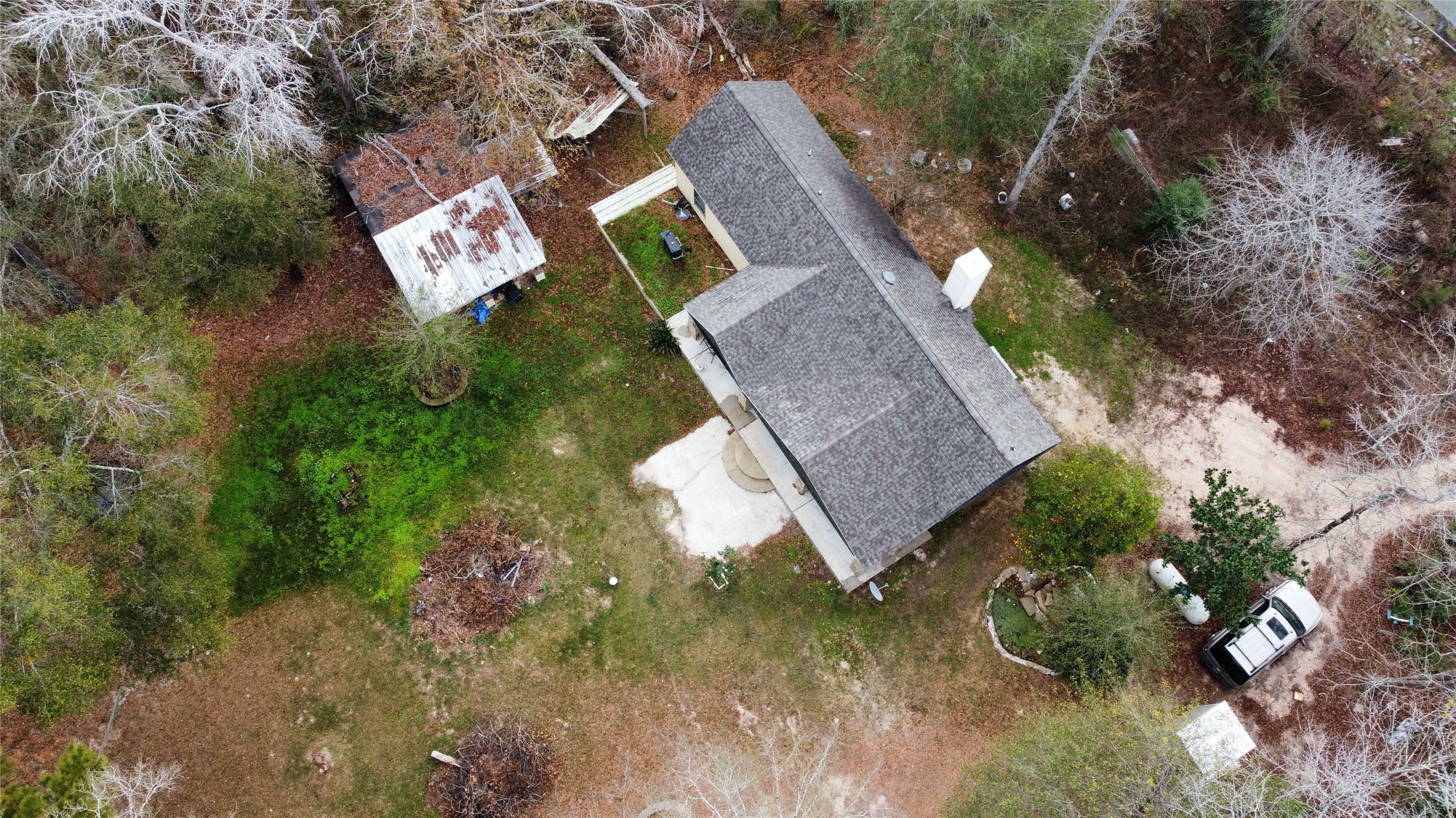13475 5th Street Splendora, TX 77372 - Photo 14 of 16 a view of a house with a yard and garden
