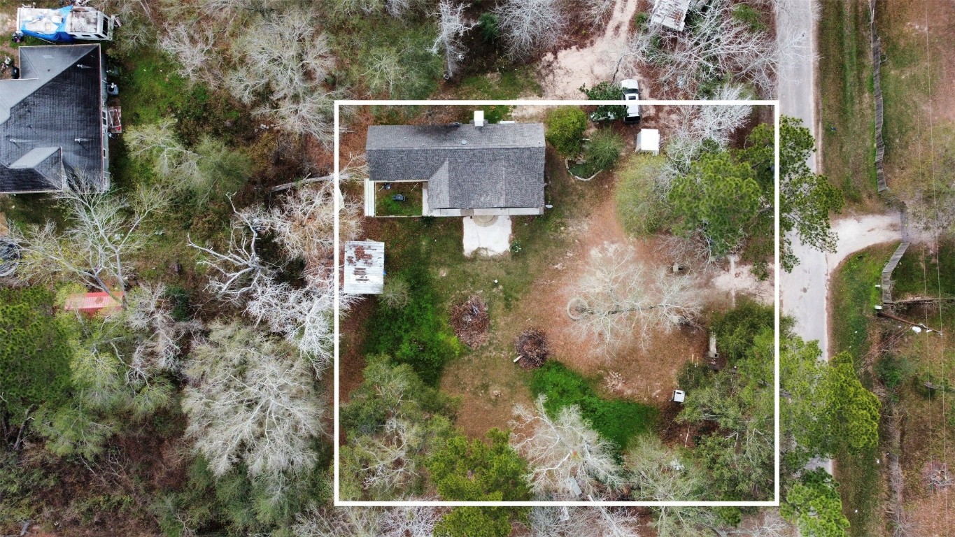 13475 5th Street Splendora, TX 77372 - Photo 15 of 16 an aerial view of houses with yard