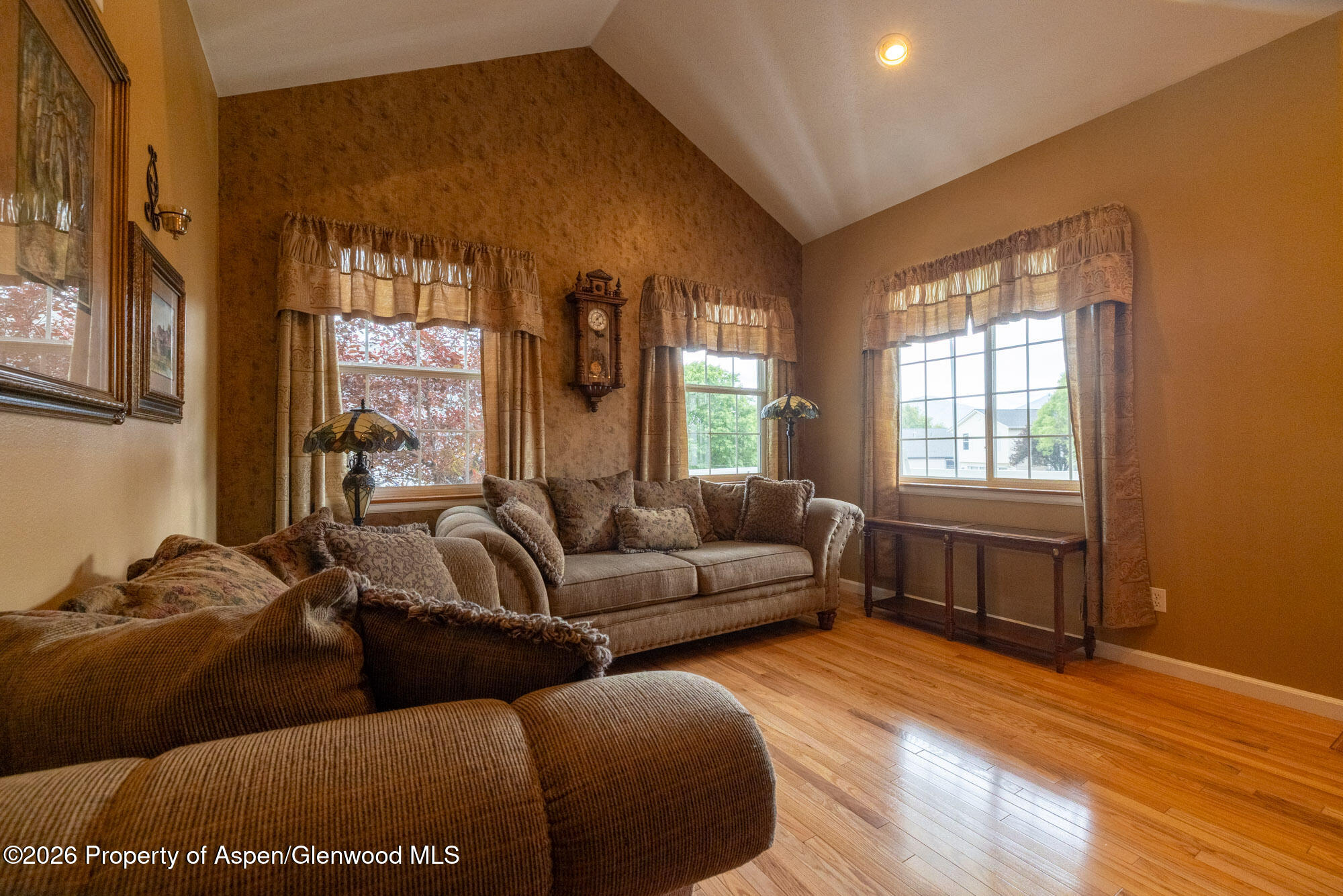 1335 Firethorn Drive Rifle, CO 81650 - Photo 9 of 30 a living room with furniture and a window