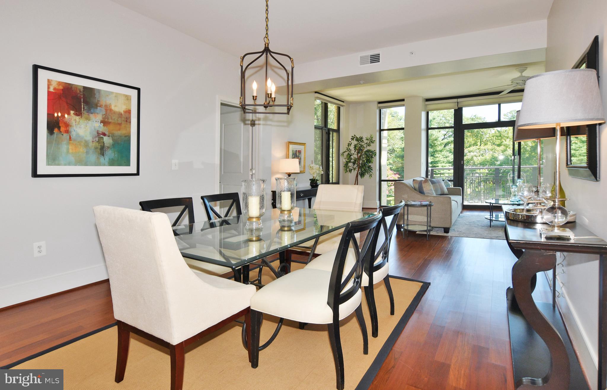 4301 Military Road Northwest, Unit 407 Washington, DC 20015 - Photo 9 of 44 Dining Room Area with Chandelier