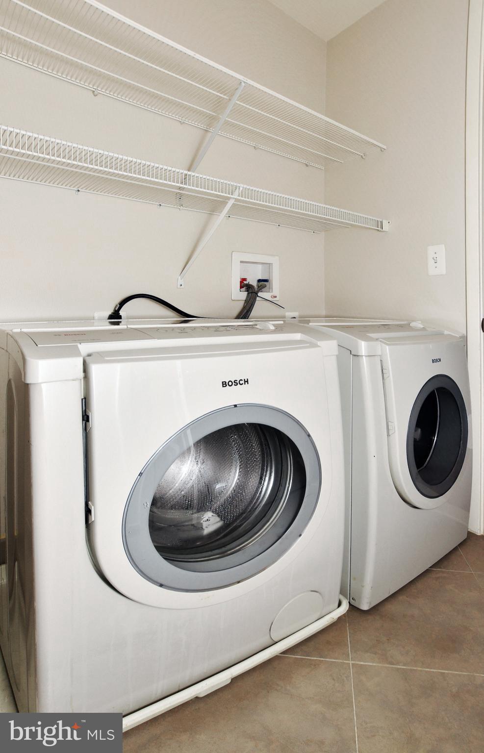 4301 Military Road Northwest, Unit 407 Washington, DC 20015 - Photo 28 of 44 Large Laundry Room-Bosch Front-Load Washer/Dryer