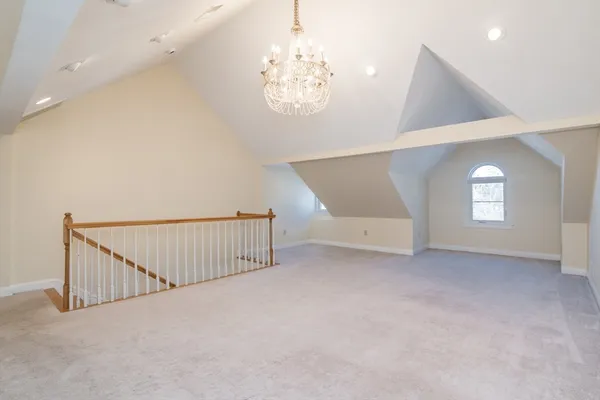 en view interior of a house with a chandelier fan