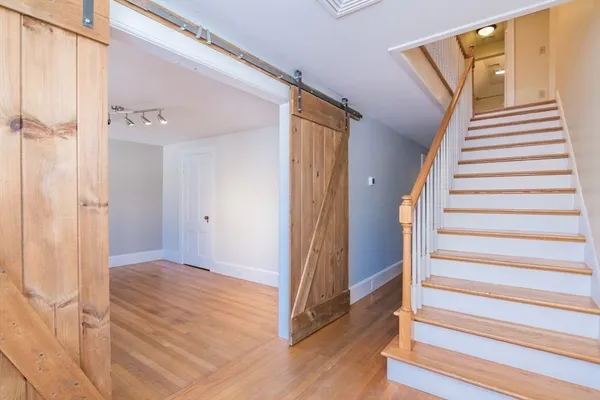 a view of an entryway with staircase