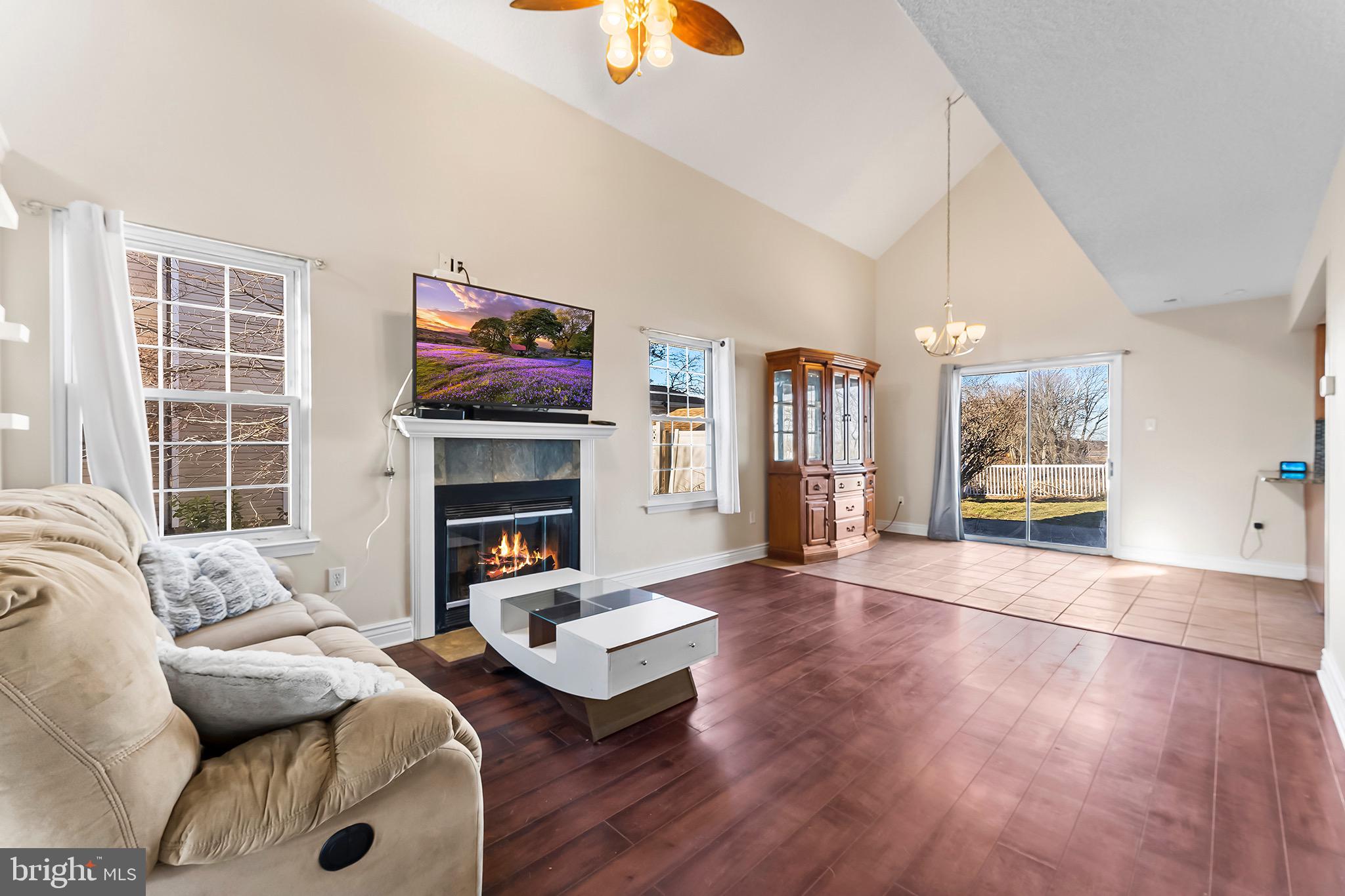 223 Stirrup Road Swedesboro, NJ 08085 - Photo 5 of 30 a living room with furniture fireplace and window
