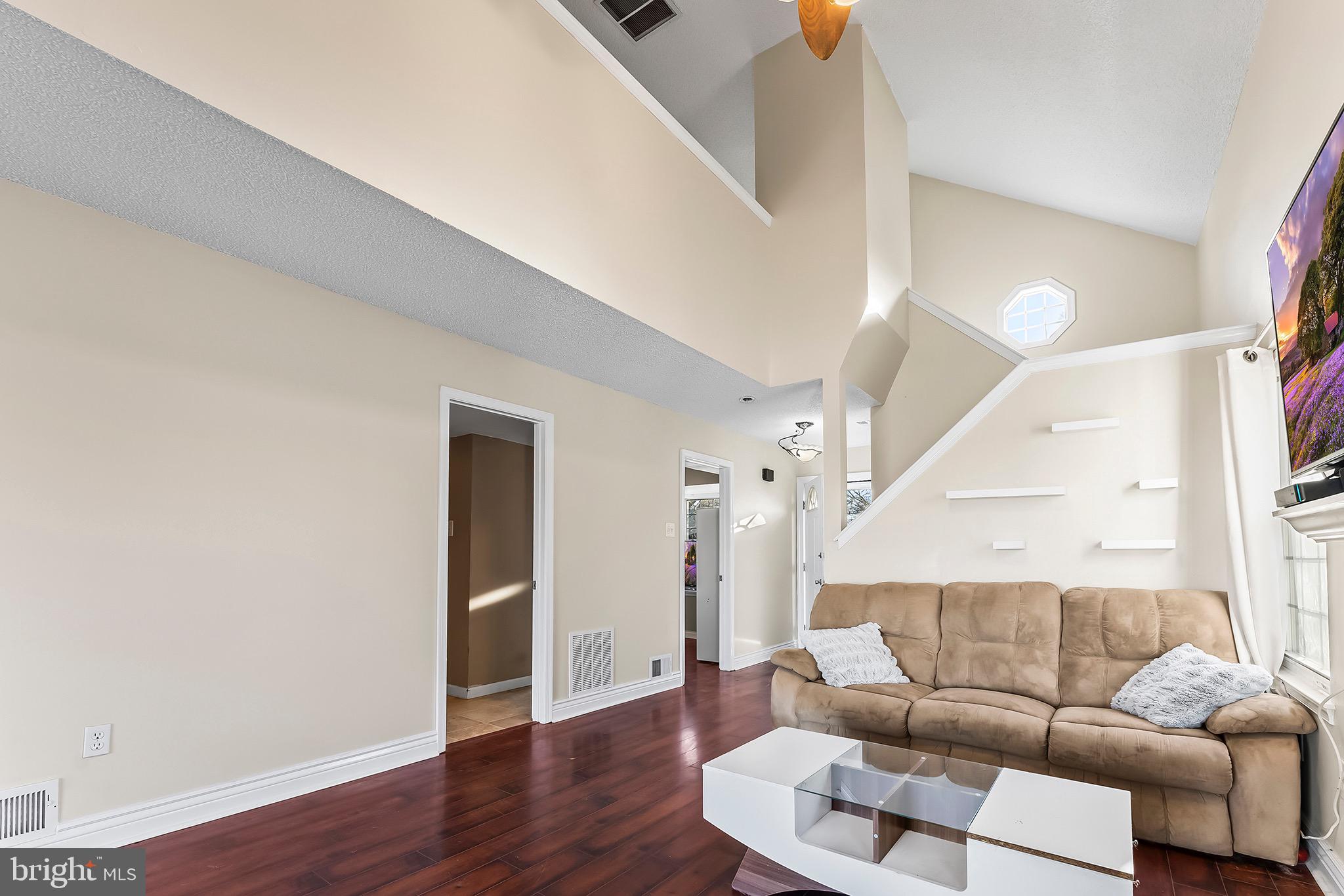223 Stirrup Road Swedesboro, NJ 08085 - Photo 7 of 30 a living room with furniture and wooden floor