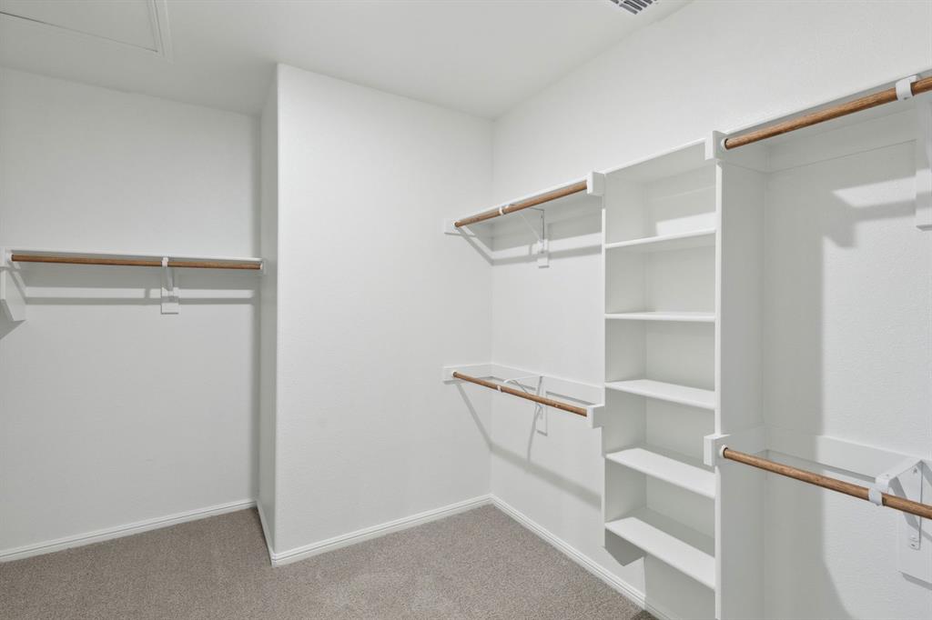 509 River Rdg Drive McKinney, TX 75071 - Photo 17 of 39 Primary Closet in the Holden home plan by Trophy Signature Homes – REPRESENTATIVE PHOTO