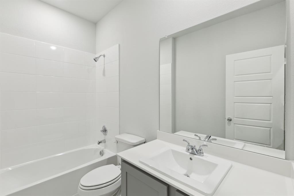 509 River Rdg Drive McKinney, TX 75071 - Photo 32 of 39 Bathroom in the Holden home plan by Trophy Signature Homes – REPRESENTATIVE PHOTO