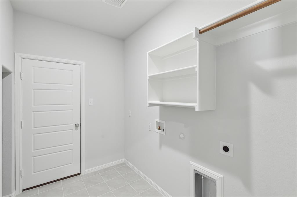 509 River Rdg Drive McKinney, TX 75071 - Photo 33 of 39 Utility Room in the Holden home plan by Trophy Signature Homes – REPRESENTATIVE PHOTO