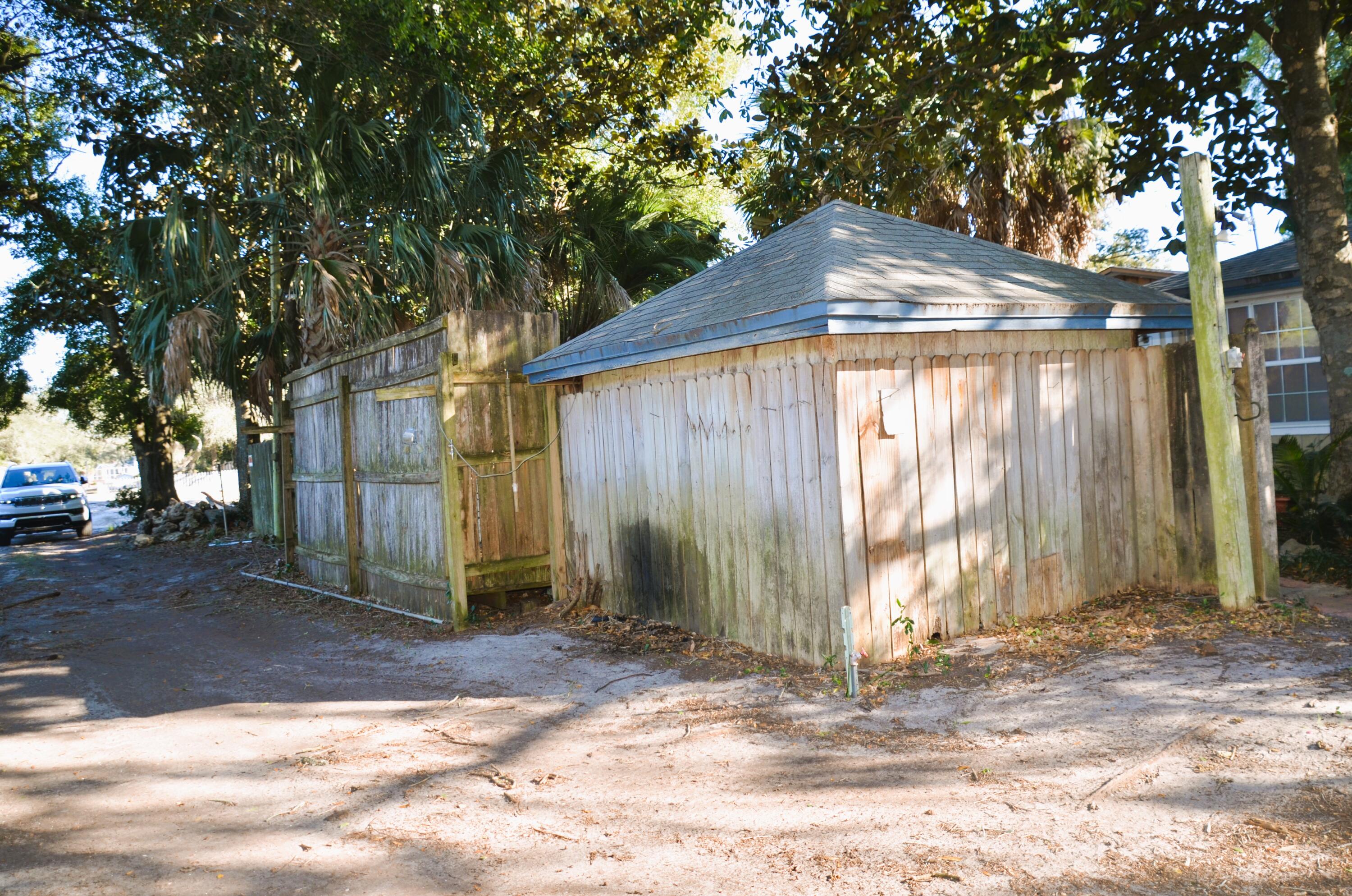 515 Beach Drive Destin, FL 32541 - Photo 25 of 43 a backyard of a house