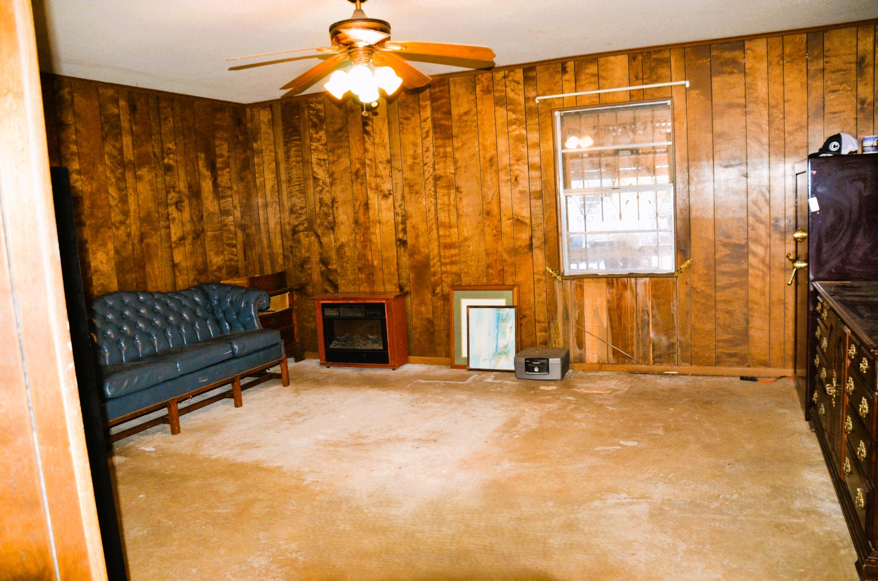 515 Beach Drive Destin, FL 32541 - Photo 10 of 43 a view of empty room with floor to ceiling window and fireplace