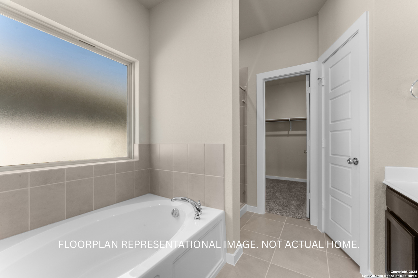 10411 Hotspur Road Converse, TX 78109 - Photo 20 of 47 a bathroom with a tub and shower