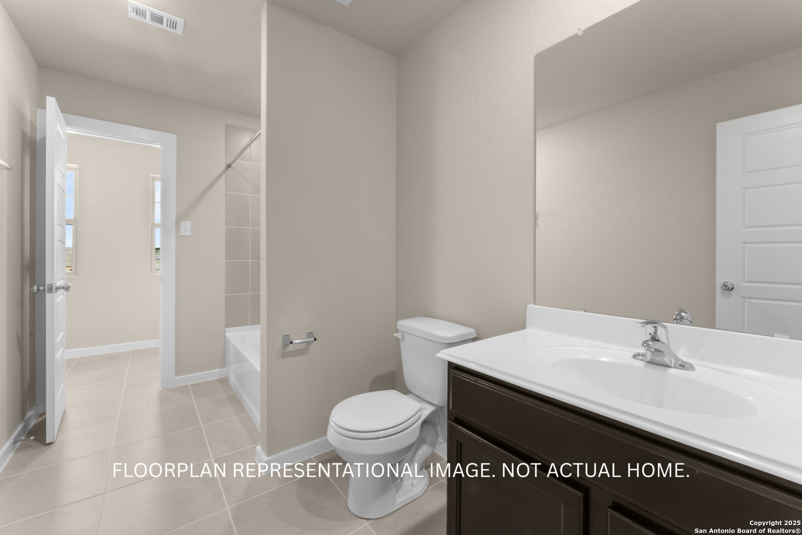 10411 Hotspur Road Converse, TX 78109 - Photo 26 of 47 a bathroom with a sink a toilet and shower