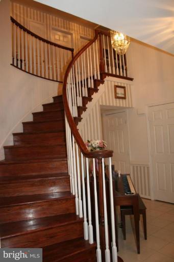 8965 Scott Street Springfield, VA 22153 - Photo 14 of 30 Unique Curved Staircase in Foyer