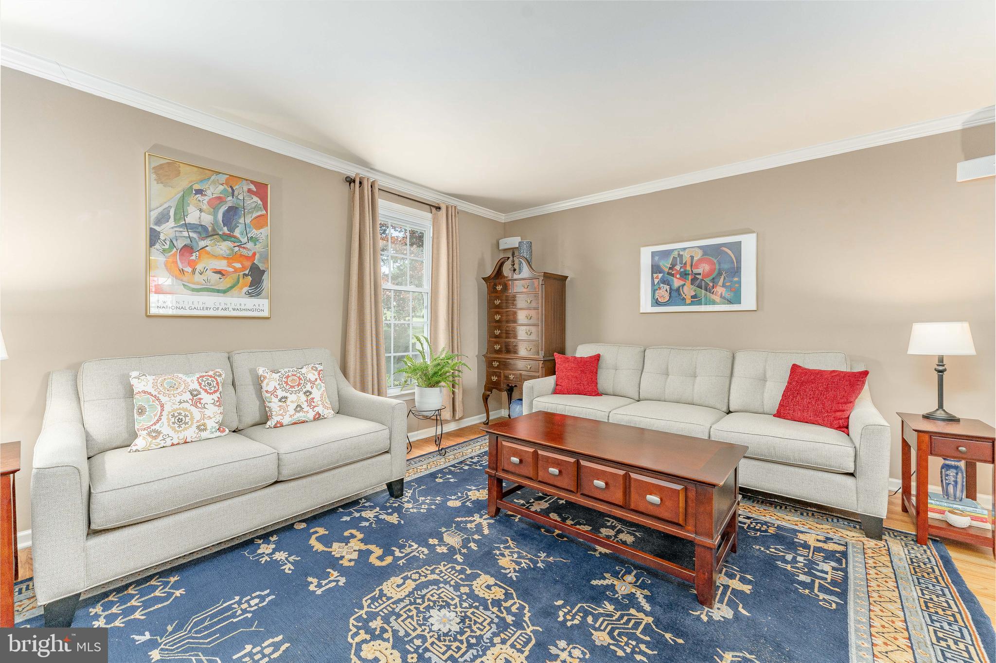 84 North Spring Lane Phoenixville, PA 19460 - Photo 6 of 51 a living room with furniture a couch and a large window