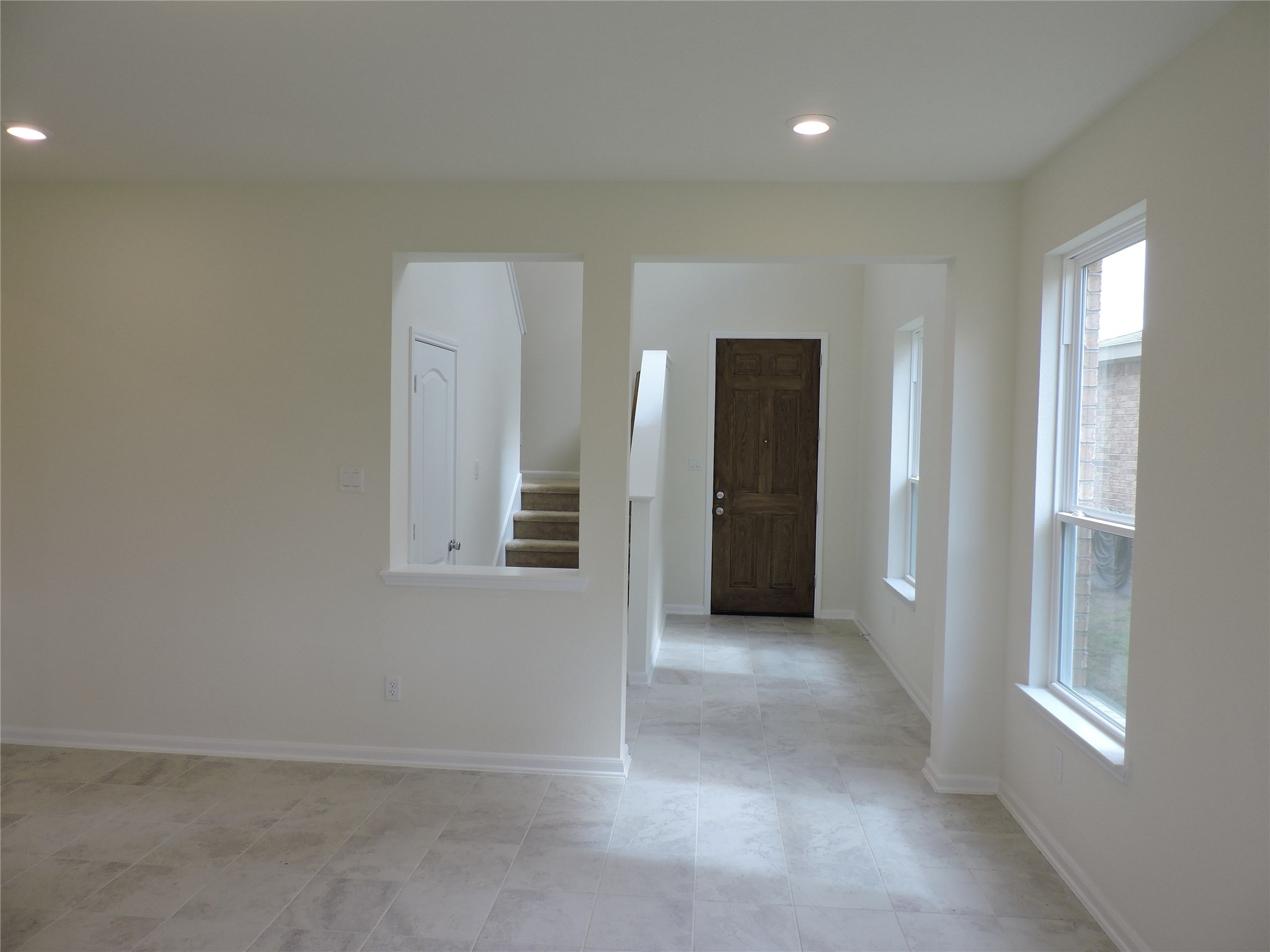 1122 Epworth Ct. Conroe, TX 77304 - Photo 16 of 35 an empty room with closet and windows