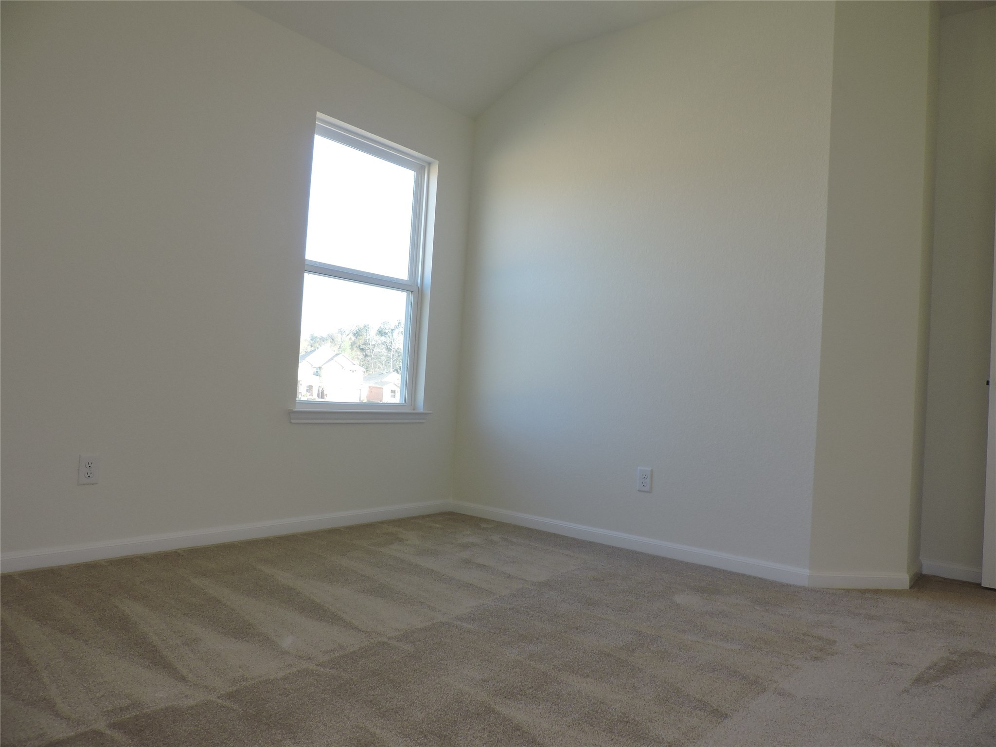 1122 Epworth Ct. Conroe, TX 77304 - Photo 29 of 35 an empty room with a window