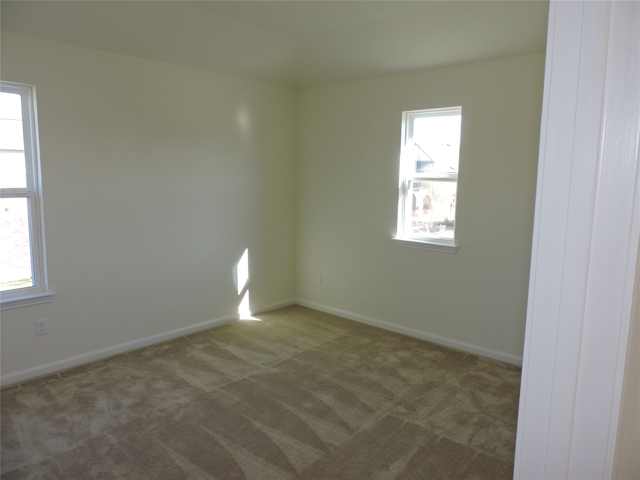 1122 Epworth Ct. Conroe, TX 77304 - Photo 31 of 35 an empty room with windows