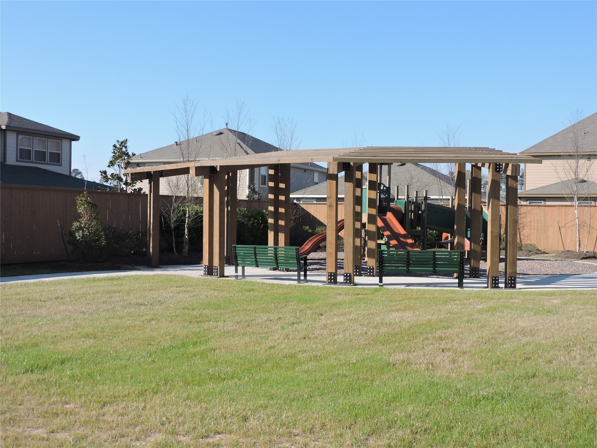 1122 Epworth Ct. Conroe, TX 77304 - Photo 32 of 35 a view of a room with lots of windows and plants