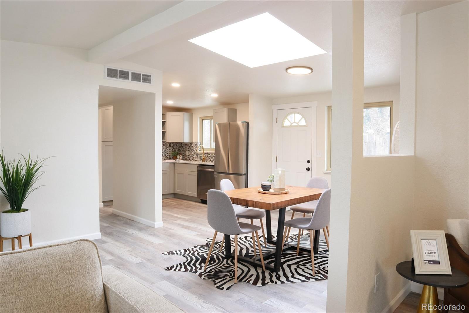 635 West Prospect Road Fort Collins, CO 80526 - Photo 14 of 17 a view of a dining room with furniture and window