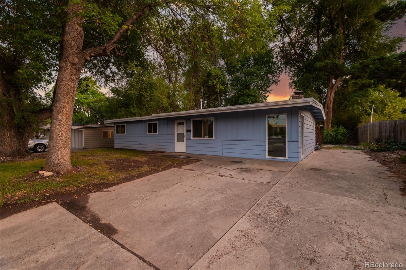 635 West Prospect Road Fort Collins, CO 80526 - Photo 17 of 17 a view of a house with a yard