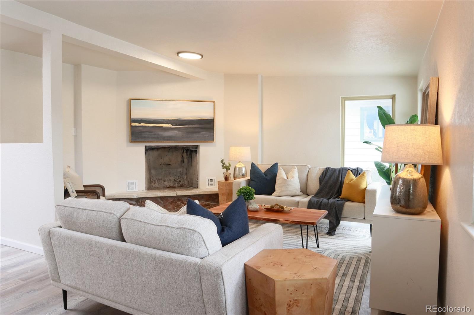 635 West Prospect Road Fort Collins, CO 80526 - Photo 5 of 17 a living room with furniture and a fireplace