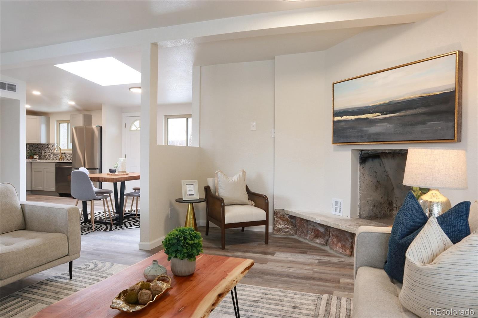 635 West Prospect Road Fort Collins, CO 80526 - Photo 8 of 17 a living room with furniture wooden floor and kitchen view