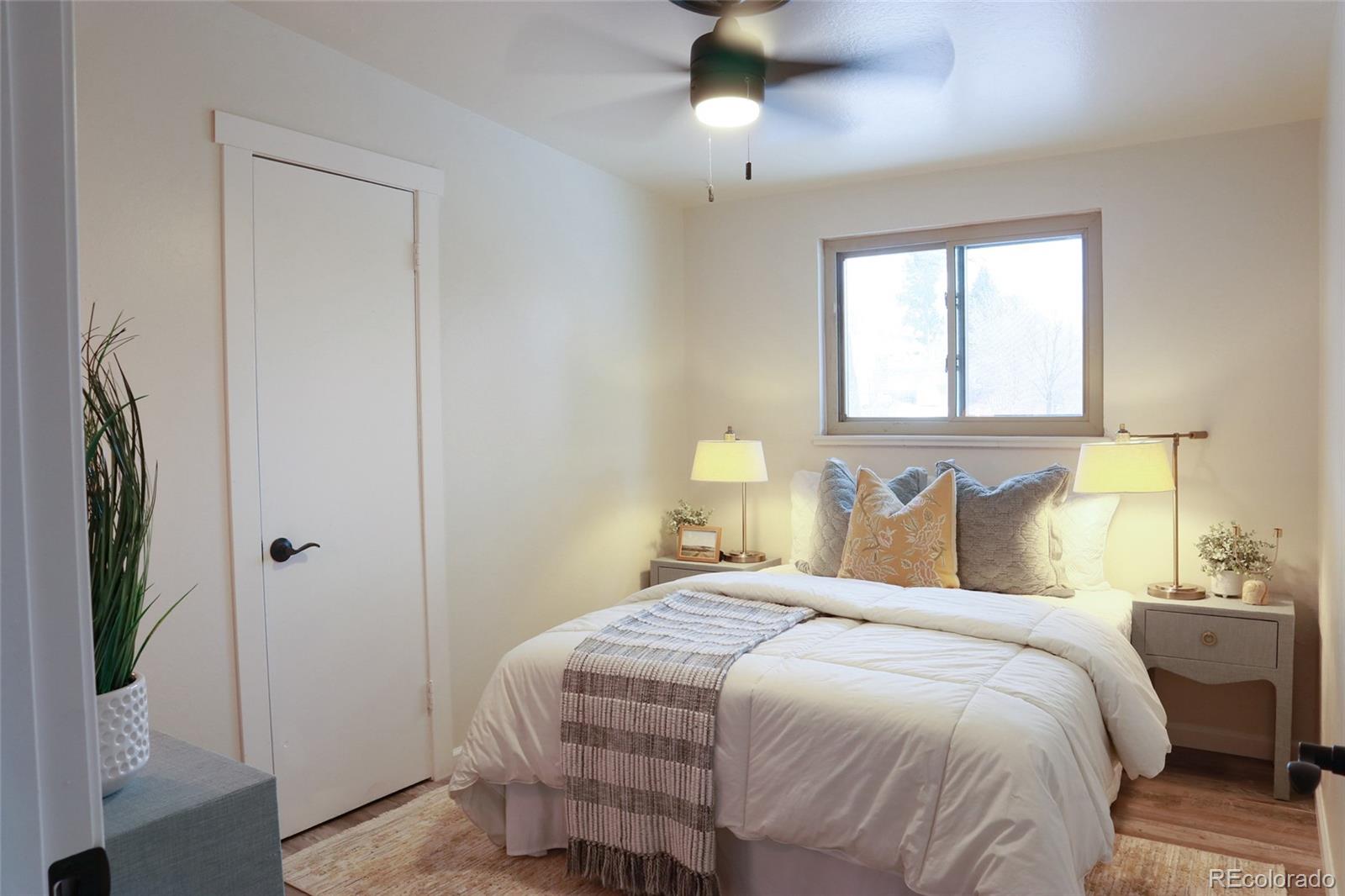 635 West Prospect Road Fort Collins, CO 80526 - Photo 9 of 17 a bedroom with a bed and a window