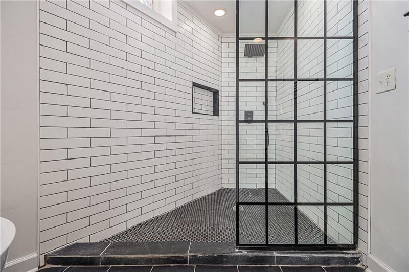 1112 Delaware Avenue Southeast Atlanta, GA 30316 - Photo 15 of 30 a bathroom with a shower