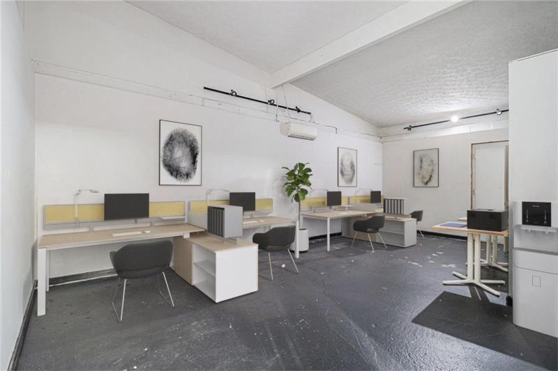 1112 Delaware Avenue Southeast Atlanta, GA 30316 - Photo 22 of 30 a living room with furniture a clock on wall and a window