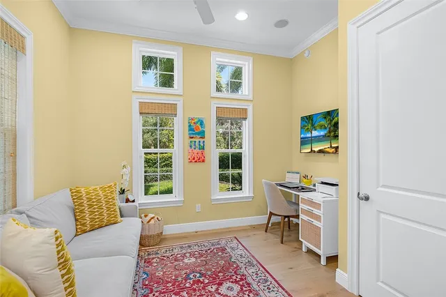 a living room with furniture and a window
