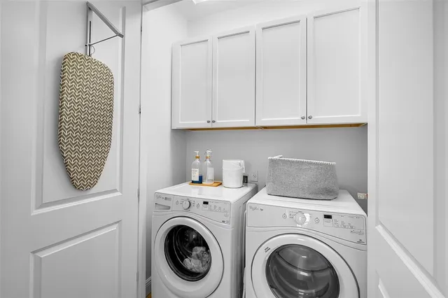 a view of hallway with washer and dryer