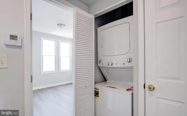 a view of room with window and washer