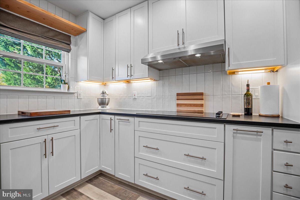 1755 Lottie Fowler Road Prince Frederick, MD 20678 - Photo 17 of 76 a kitchen with appliances cabinets and a window