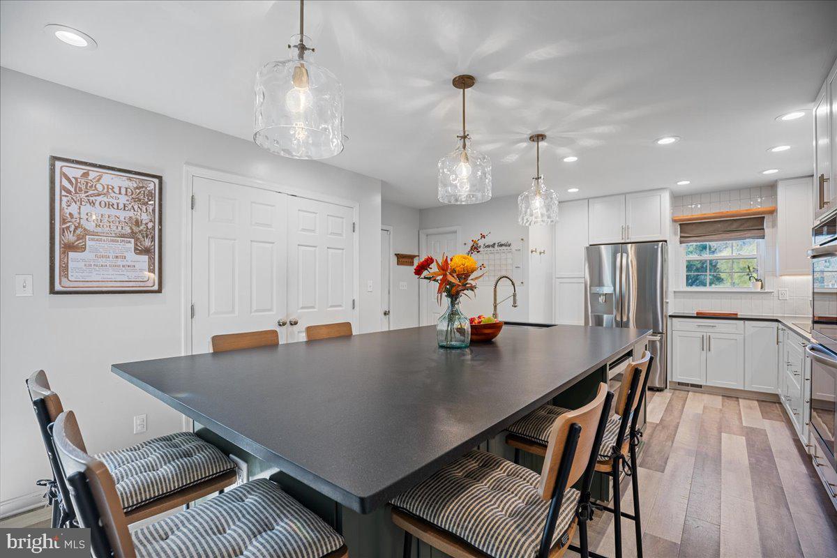1755 Lottie Fowler Road Prince Frederick, MD 20678 - Photo 20 of 76 a view of a dining room and livingroom