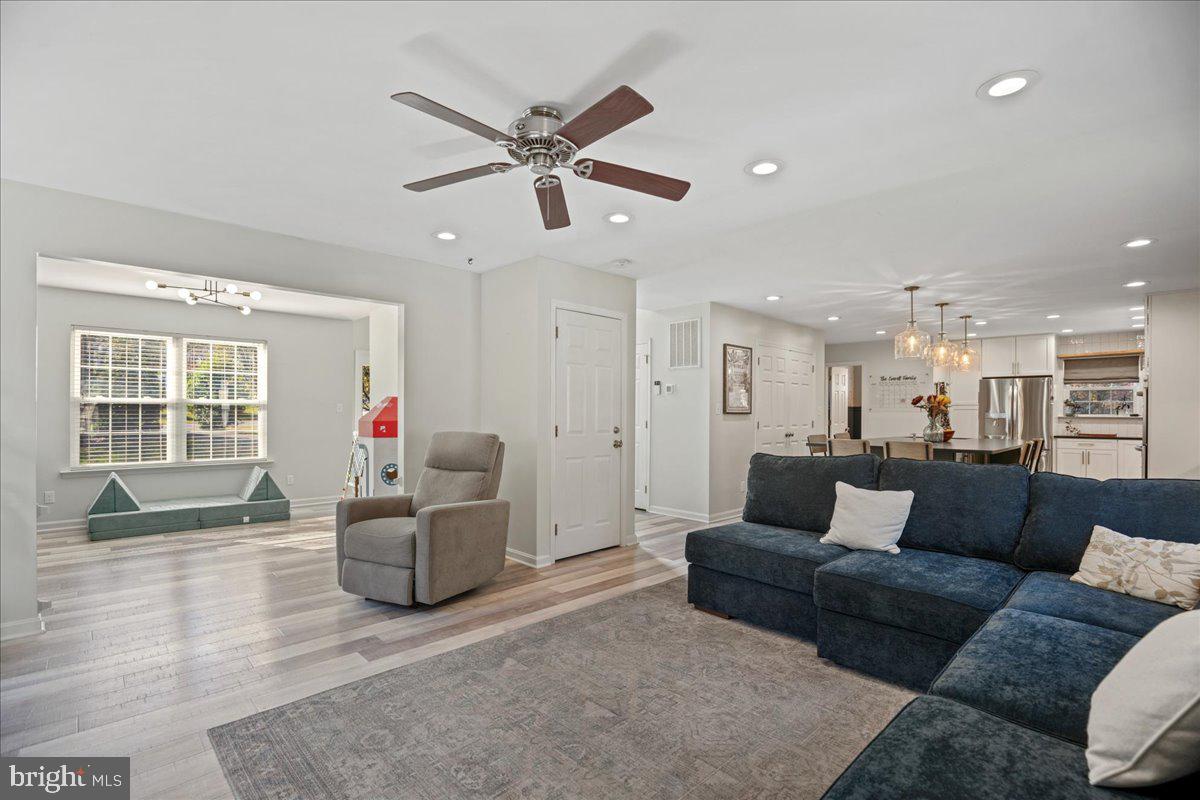 1755 Lottie Fowler Road Prince Frederick, MD 20678 - Photo 35 of 76 a living room with furniture and a large window