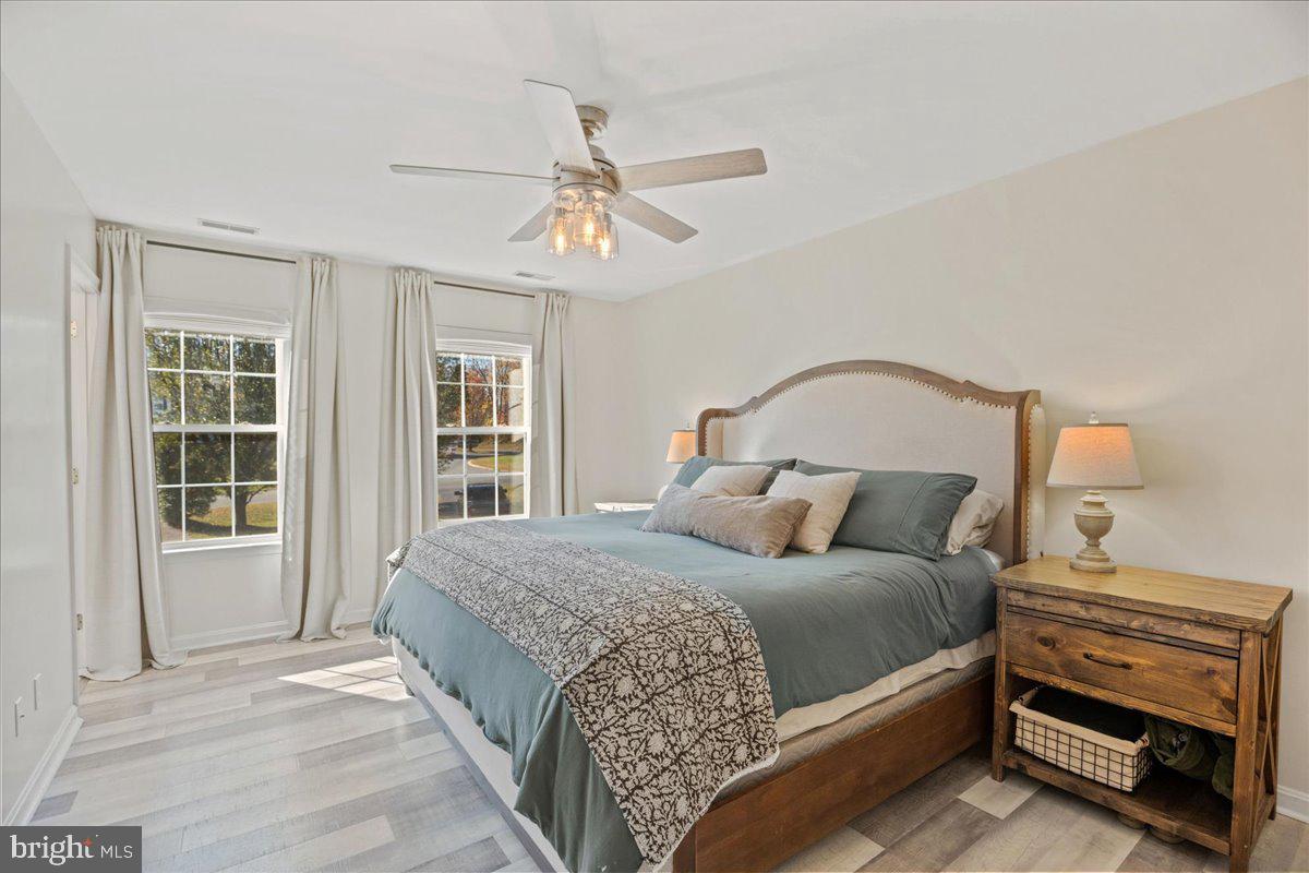 1755 Lottie Fowler Road Prince Frederick, MD 20678 - Photo 41 of 76 a bedroom with a bed and a window