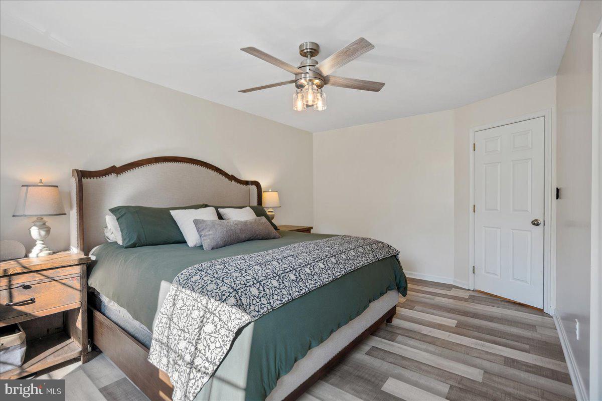 1755 Lottie Fowler Road Prince Frederick, MD 20678 - Photo 42 of 76 a bedroom with a bed and window