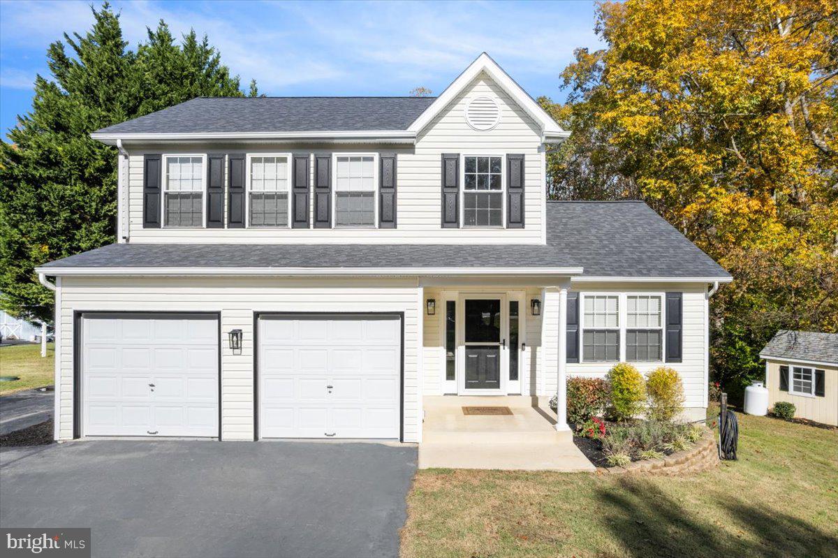 1755 Lottie Fowler Road Prince Frederick, MD 20678 - Photo 5 of 76 a front view of a house with garden