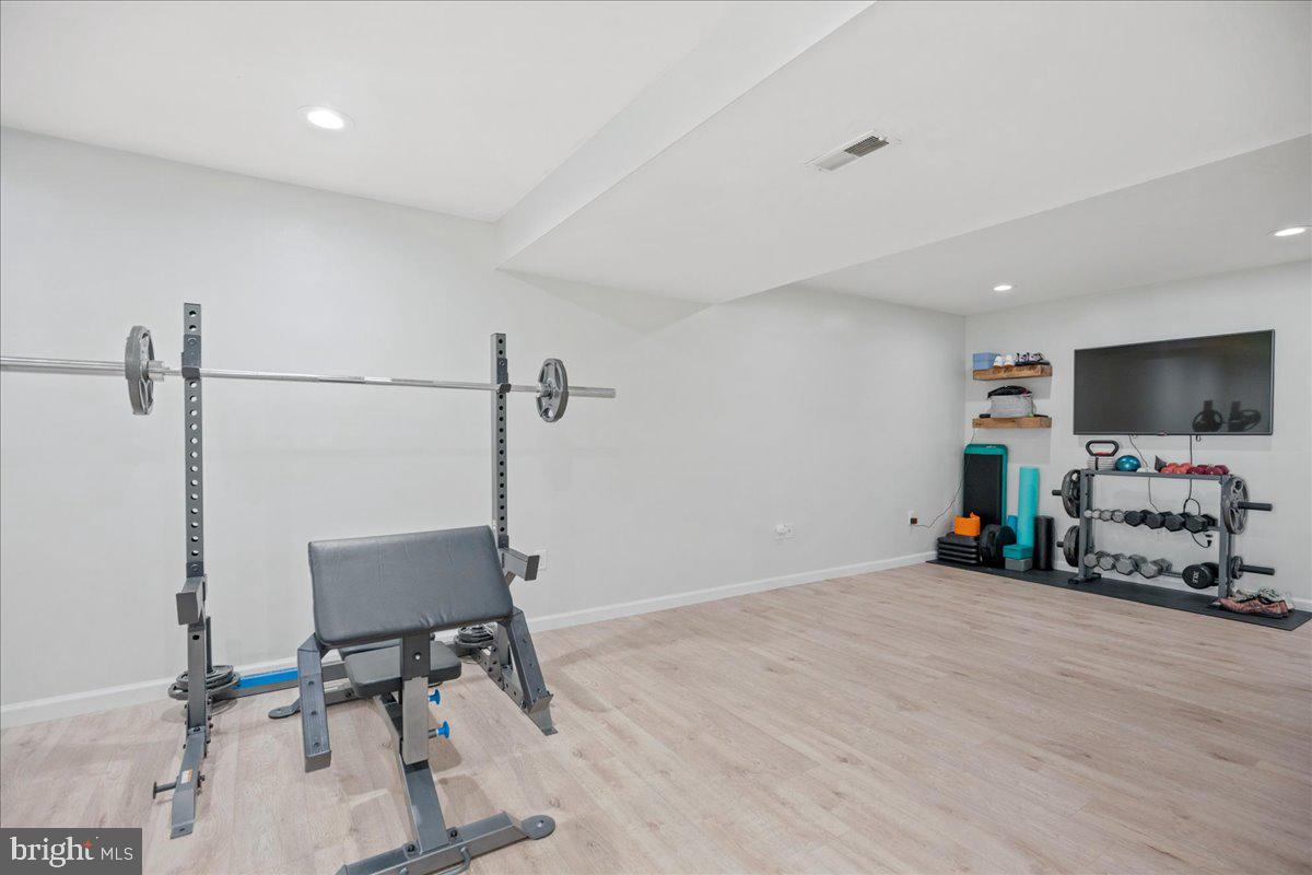 1755 Lottie Fowler Road Prince Frederick, MD 20678 - Photo 54 of 76 a view of a room with gym equipment
