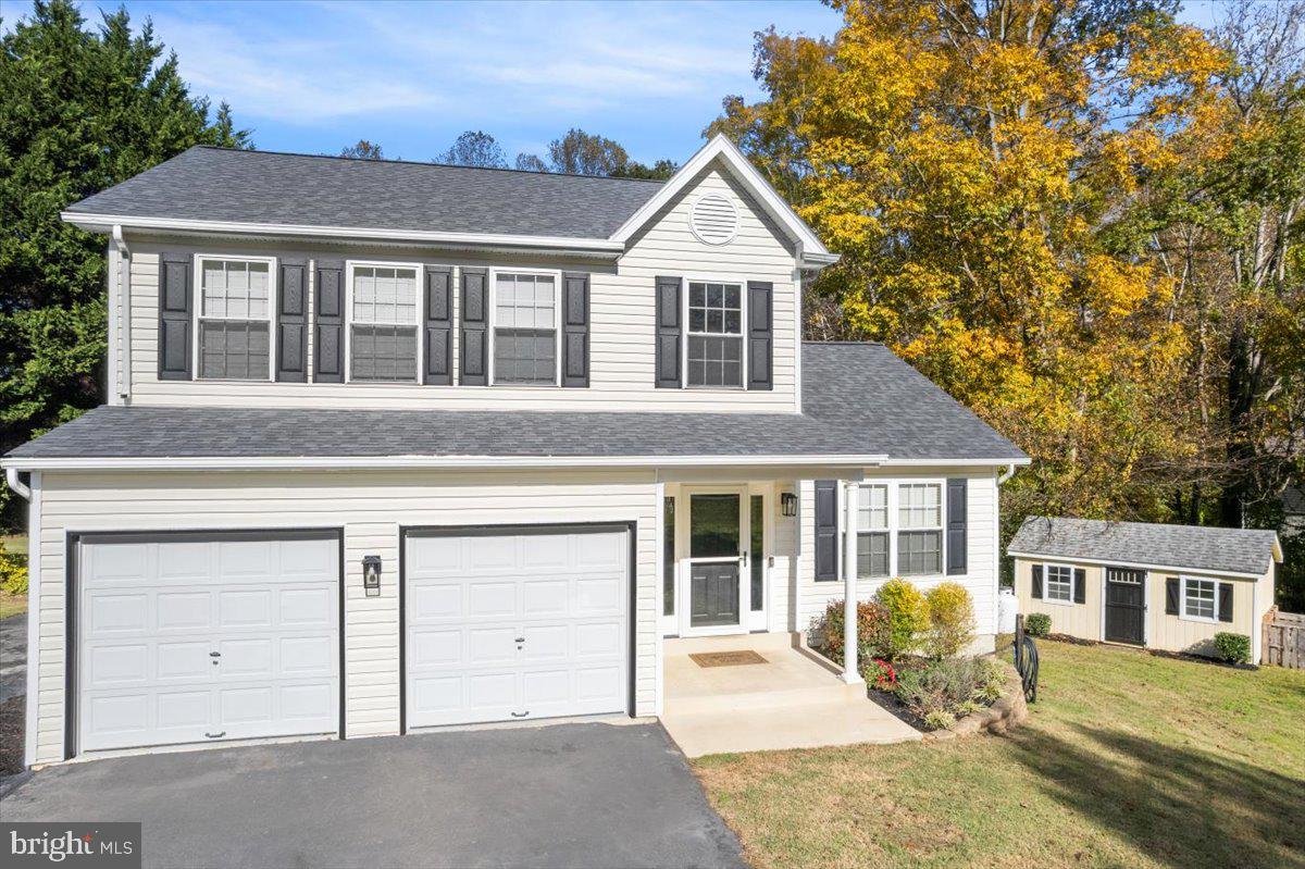 1755 Lottie Fowler Road Prince Frederick, MD 20678 - Photo 57 of 76 front view of a house with a yard