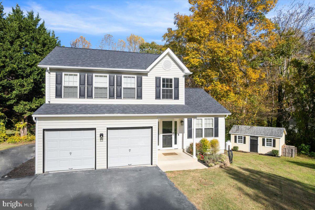 1755 Lottie Fowler Road Prince Frederick, MD 20678 - Photo 9 of 76 a front view of a house with a yard