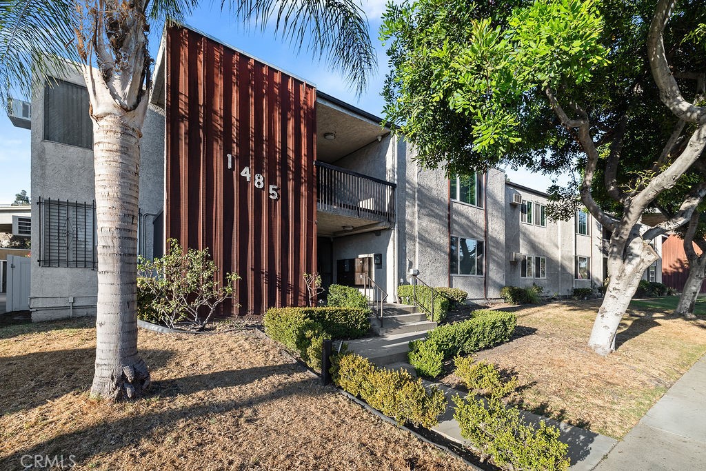 1485 East Wilson Avenue, Unit M Glendale, CA 91206 - Photo 1 of 19 a view of a house with a yard and sitting area