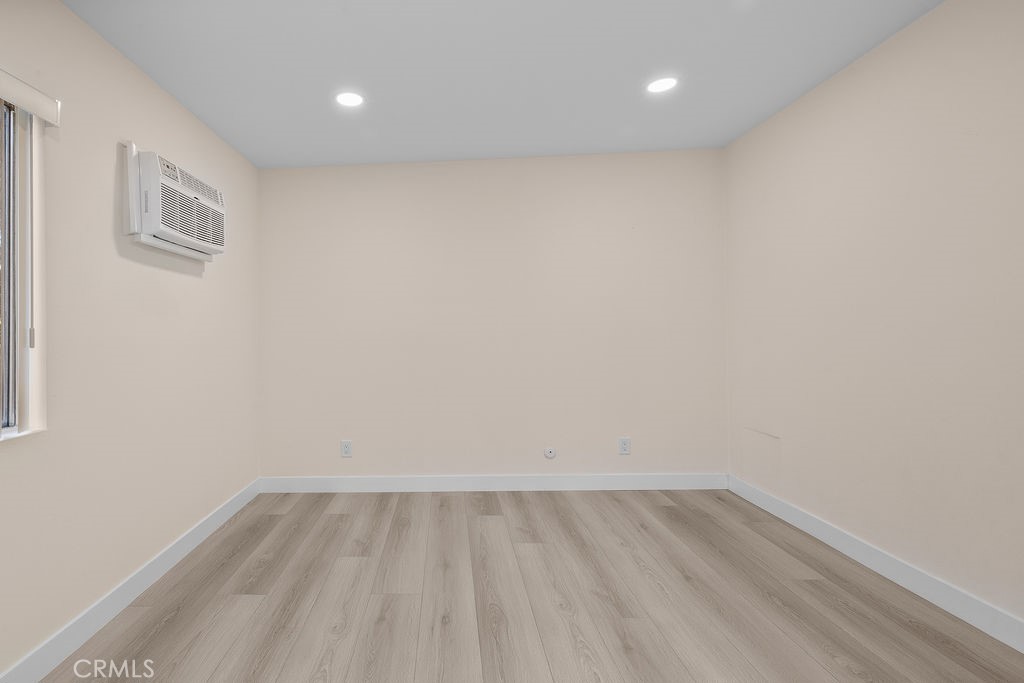 1485 East Wilson Avenue, Unit M Glendale, CA 91206 - Photo 14 of 19 a view of room with wooden floor