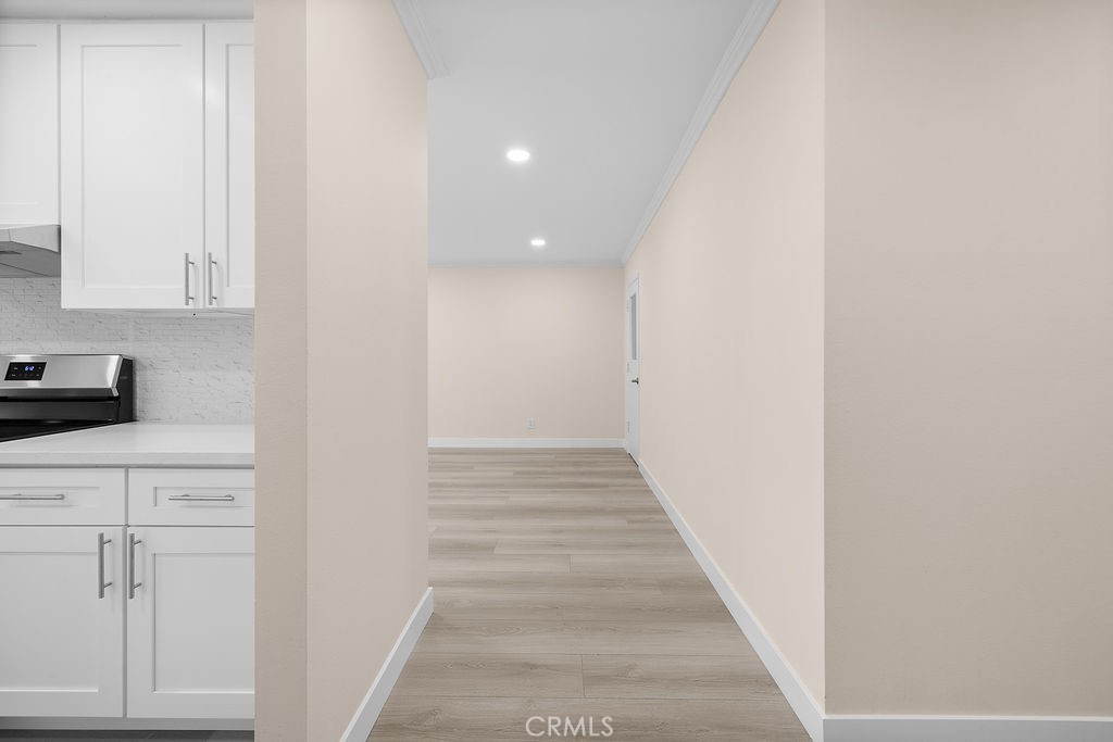 1485 East Wilson Avenue, Unit M Glendale, CA 91206 - Photo 3 of 19 a view of an entryway with wooden floor