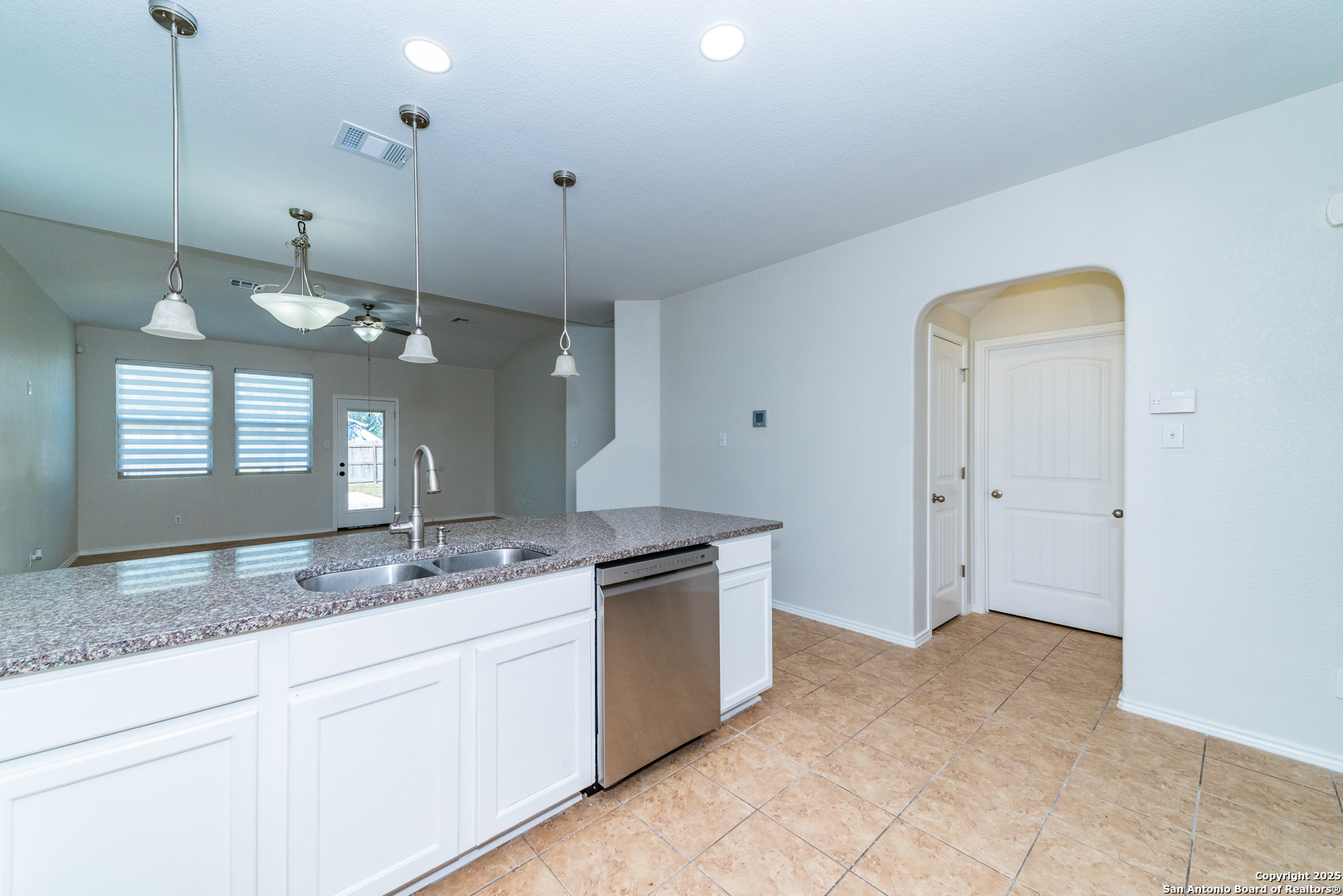 7735 Brisbane Bend Converse, TX 78109 - Photo 3 of 15 a view of a kitchen counter space and a sink